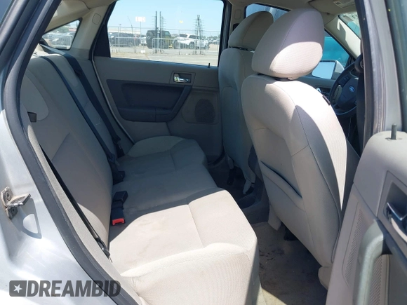 2008 Ford Focus SE with VIN 1FAHP35N28W300528, listed as a IAAI auction lot 42149643 with 138,115 mi miles. Bid and sale history available at carsss.com. Image 8.