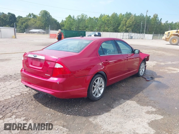 2012 Ford Fusion SEL z VIN 3FAHP0JG6CR417272, wystawiony jako IAAI lot #40384846 z przebiegiem 176 772 mil mil oraz . Historia ofert i sprzedaży dostępna na DreamBid. Obrazek 4.