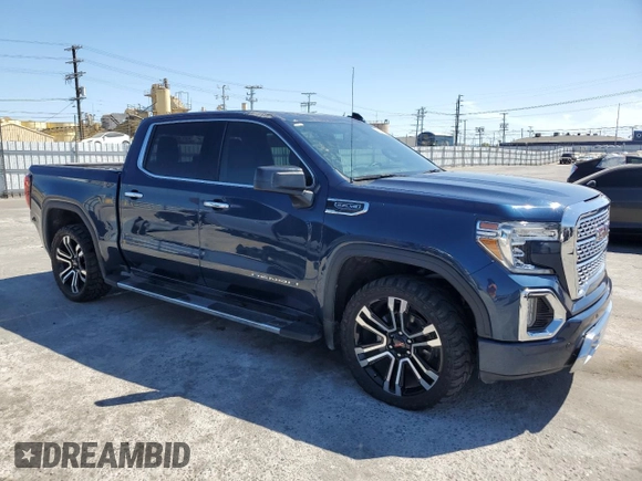 2022 GMC Sierra 1500 Denali with VIN 3GTU9FEDXNG213711, listed as a Copart auction lot 64112245 with 63,476 mi miles and Salvage title. Bid and sale history available at DreamBid. Image 4.