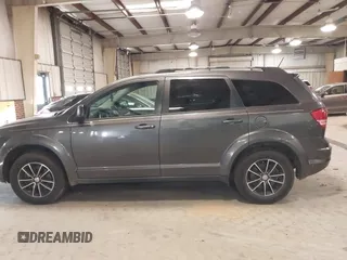 2017 Dodge Journey SE with VIN 3C4PDCAB2HT684231, listed as a IAAI auction lot 41189943 with 201,549 mi miles and . Bid and sale history available at DreamBid. Image 14.
