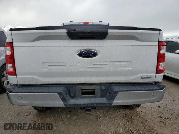 2021 Ford F-150 XL with VIN 1FTMF1EP8MKE68354, listed as a Copart auction lot 84733944 with 97,313 mi miles and Salvage title. Bid and sale history available at DreamBid. Image 6.