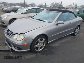 2005 Mercedes-Benz CLK 500 with VIN WDBTK75GX5T045909, listed as a IAAI auction lot 41173758 with 195,597 mi miles and . Bid and sale history available at DreamBid. Image 2.