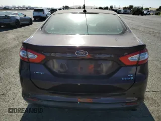 2013 Ford Fusion SE Hybrid z VIN 3FA6P0LU6DR365363, wystawiony jako Copart lot #62325625 z przebiegiem 226 624 mil mil oraz Czysty tytuł • Clean title. Historia ofert i sprzedaży dostępna na DreamBid. Obrazek 6.