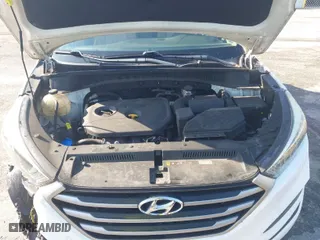 2018 Hyundai Tucson SE with VIN KM8J23A42JU627533, listed as a IAAI auction lot 41880112 with 61,840 mi miles. Bid and sale history available at carsss.com. Image 10.