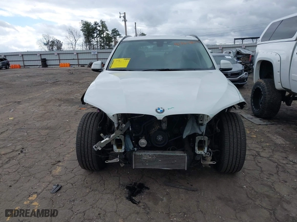 2015 BMW X5 sDrive35i with VIN 5UXKR2C54F0H34975, listed as a IAAI auction lot 41704467 with 92,006 mi miles. Bid and sale history available at carsss.com. Image 12.
