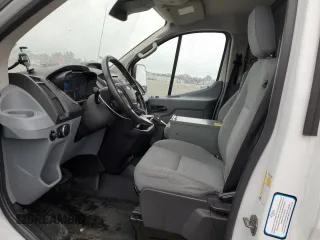 2016 Ford Transit Cargo with VIN 1FTYR2ZMXGKA99273, listed as a Copart auction lot 59289105 with 165,185 mi miles and Salvage title. Bid and sale history available at DreamBid. Image 7.