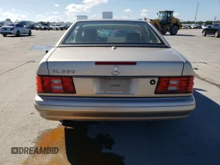 2000 Mercedes-Benz SL-Class with VIN WDBFA68F0YF188299, listed as a Copart auction lot 79522494 with 125,295 mi miles and Salvage Title. Bid and sale history available at carsss.com. Image 6.