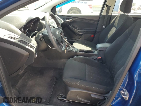 2018 Ford Focus SE z VIN 1FADP3F20JL293119, wystawiony jako Copart lot #58376765 z przebiegiem 38 322 mil mil oraz Szkoda całkowita • Salvage title. Historia ofert i sprzedaży dostępna na DreamBid. Obrazek 7.