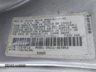1990 Toyota Camry z VIN 4T1SV24E0LU190211, wystawiony jako IAAI lot #42368986 z przebiegiem 145 167 mil mil oraz . Historia ofert i sprzedaży dostępna na DreamBid. Obrazek 9.