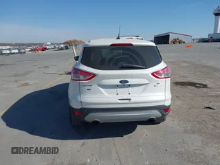 2014 Ford Escape SE with VIN 1FMCU0G99EUA71540, listed as a IAAI auction lot 40651416 with 230,849 mi miles. Bid and sale history available at carsss.com. Image 13.
