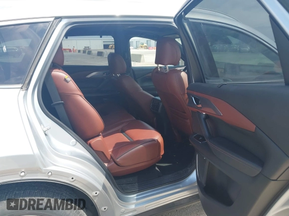 2016 Mazda CX-9 Signature with VIN JM3TCBEY9G0117785, listed as a IAAI auction lot 42331883 with 115,096 mi miles and . Bid and sale history available at DreamBid. Image 8.