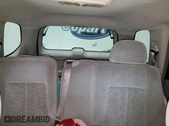 2005 GMC Envoy SLE с VIN 1GKDS13S752274178, выставлен на аукционе Copart как лот 55289005 с пробегом 199 378 миль миль и Списание • Salvage title. История ставок и продаж доступна на DreamBid. Изображение 10.