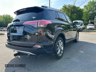 2016 Toyota RAV4 Limited with VIN JTMDJREV1GD020395, listed as a Copart auction lot 58956215 with 161,215 mi miles and Clean title. Bid and sale history available at DreamBid. Image 3.
