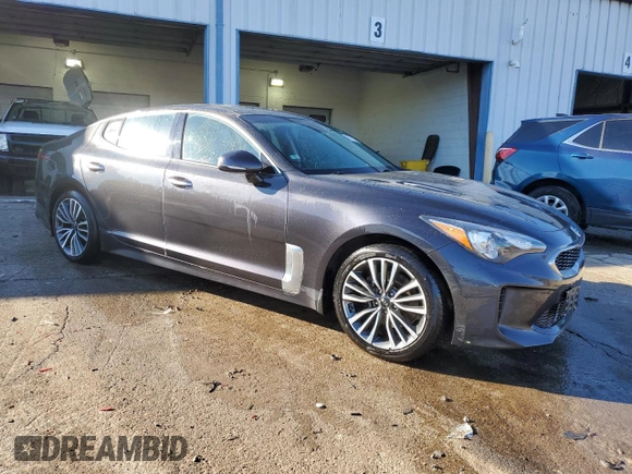 2019 Kia Stinger with VIN KNAE15LAXK6043536, listed as a Copart auction lot 42778575 with 101,200 mi miles and Salvage Title. Bid and sale history available at DreamBid. Image 4.