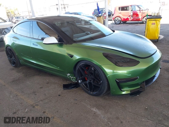 2020 Tesla Model 3 Standard Range Plus with VIN 5YJ3E1EA4LF799650, listed as a IAAI auction lot 41817538 with 54,835 mi miles. Bid and sale history available at carsss.com. Image 1.