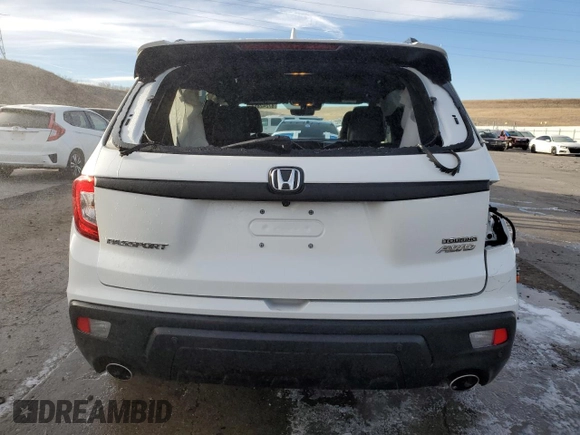 2021 Honda Passport Touring with VIN 5FNYF8H96MB005648, listed as a Copart auction lot 87242864 with 40,770 mi miles and Salvage Title. Bid and sale history available at carsss.com. Image 6.