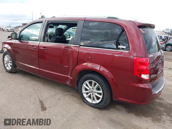 2019 Dodge Grand Caravan SXT with VIN 2C4RDGCGXKR585563, listed as a IAAI auction lot 40949350 with 122,577 mi miles and . Bid and sale history available at DreamBid. Image 3.