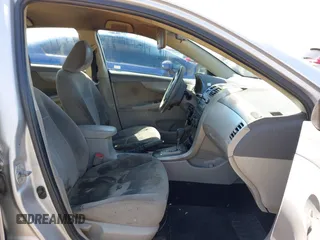 2010 Toyota Corolla with VIN 1NXBU4EE1AZ319230, listed as a IAAI auction lot 41988978 with 238,497 mi miles. Bid and sale history available at carsss.com. Image 5.