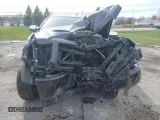 2015 GMC Sierra 1500 SLE z VIN 1GTV2UEC3FZ212843, wystawiony jako IAAI lot #42030130 z przebiegiem Nie podano mil oraz . Historia ofert i sprzedaży dostępna na DreamBid. Obrazek 12.