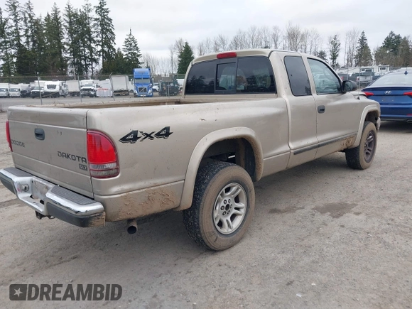 2004 Dodge Dakota SLT with VIN 1D7HG42N44S525545, listed as a IAAI auction lot 41739083 with 266,353 mi miles. Bid and sale history available at carsss.com. Image 4.