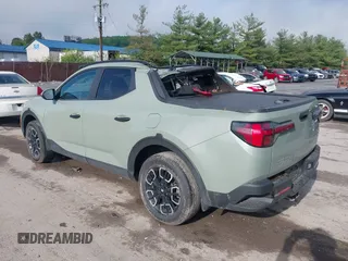 2022 Hyundai Santa Cruz SEL z VIN 5NTJCDAE8NH024149, wystawiony jako IAAI lot #42197663 z przebiegiem 51 491 mil mil oraz . Historia ofert i sprzedaży dostępna na DreamBid. Obrazek 3.