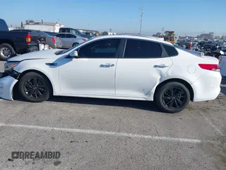 2016 Kia Optima LX with VIN 5XXGT4L33GG014082, listed as a IAAI auction lot 41870030 with 137,849 mi miles and . Bid and sale history available at DreamBid. Image 13.