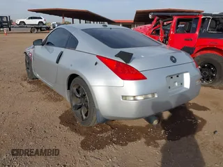 2007 Nissan 350Z Touring z VIN JN1BZ34E87M551658, wystawiony jako IAAI lot #41913235 z przebiegiem 166 786 mil mil oraz . Historia ofert i sprzedaży dostępna na DreamBid. Obrazek 3.