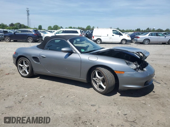 2003 Porsche Boxster with VIN WP0CA29803U623260, listed as a Copart auction lot 54511835 with 53,596 mi miles and Salvage title. Bid and sale history available at DreamBid. Image 4.