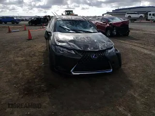 2021 Lexus UX 200 with VIN JTHX3JBH8M2036140, listed as a Copart auction lot 70534384 with 9,872 mi miles and Salvage title. Bid and sale history available at DreamBid. Image 12.