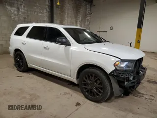 2015 Dodge Durango R/T with VIN 1C4SDHCTXFC916712, listed as a Copart auction lot 87113784 with 120,950 mi miles and Salvage Title. Bid and sale history available at DreamBid. Image 4.