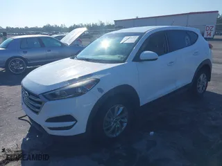 2018 Hyundai Tucson SE with VIN KM8J23A42JU627533, listed as a IAAI auction lot 41880112 with 61,840 mi miles. Bid and sale history available at carsss.com. Image 18.