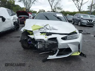 2022 BMW M4 Competition with VIN WBS33AZ04NCJ20184, listed as a IAAI auction lot 41205528 with 25,571 mi miles. Bid and sale history available at carsss.com. Image 13.