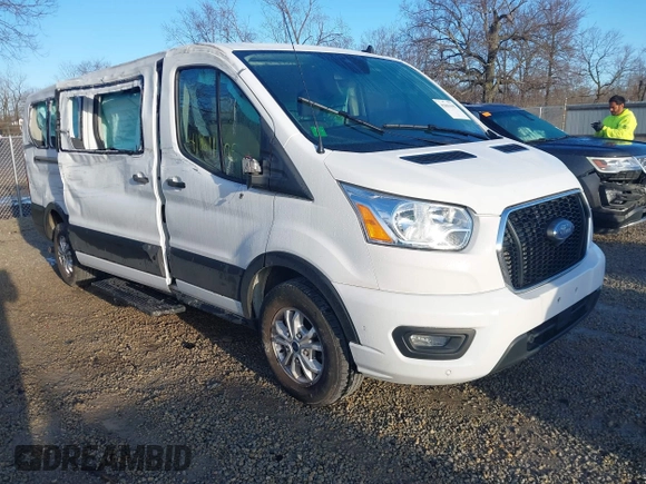 2021 Ford Transit Passenger XL with VIN 1FBAX2Y81MKA14882, listed as a IAAI auction lot 41861105 with 71,457 mi miles. Bid and sale history available at carsss.com. Image 1.