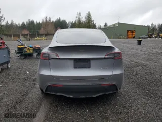2025 Tesla Model Y Performance with VIN 7SAYGDEF2SF232223, listed as a Copart auction lot 50419235 with 0 mi miles and Salvage Title. Bid and sale history available at carsss.com. Image 6.