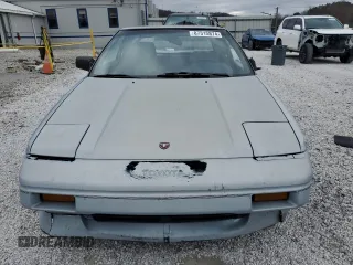 1989 Toyota MR2 z VIN JT2AW15C2K0146245, wystawiony jako Copart lot #87315874 z przebiegiem 162 741 mil mil oraz Tytuł czysty. Historia ofert i sprzedaży dostępna na DreamBid. Obrazek 5.