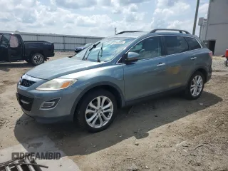 2012 Mazda CX-9 Grand Touring с VIN JM3TB2DVXC0361644, выставлен на аукционе Copart как лот 66092895 с пробегом 121 021 миль миль и Чистый • Clean title. История ставок и продаж доступна на DreamBid. Изображение 1.