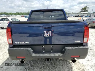 2023 Honda Ridgeline RTL-E with VIN 5FPYK3F74PB037333, listed as a Copart auction lot 56209715 with 36,041 mi miles and Salvage title. Bid and sale history available at DreamBid. Image 6.