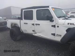 2022 Jeep Gladiator Rubicon z VIN 1C6JJTBG3NL111054, wystawiony jako IAAI lot #40793144 z przebiegiem 40 115 mil mil oraz . Historia ofert i sprzedaży dostępna na DreamBid. Obrazek 6.