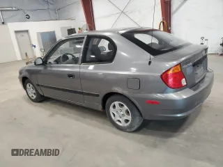 2004 Hyundai Accent z VIN KMHCF35C14U310393, wystawiony jako Copart lot #57840235 z przebiegiem 50 825 mil mil oraz Tytuł czysty. Historia ofert i sprzedaży dostępna na DreamBid. Obrazek 2.