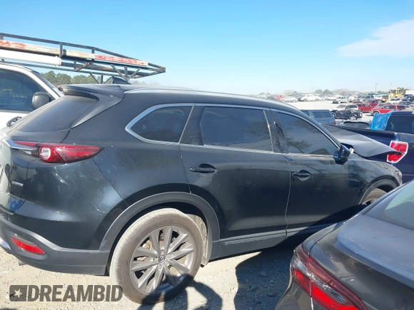 2020 Mazda CX-9 Grand Touring with VIN JM3TCADY8L0405173, listed as a IAAI auction lot 41701533 with 58,119 mi miles and . Bid and sale history available at DreamBid. Image 13.