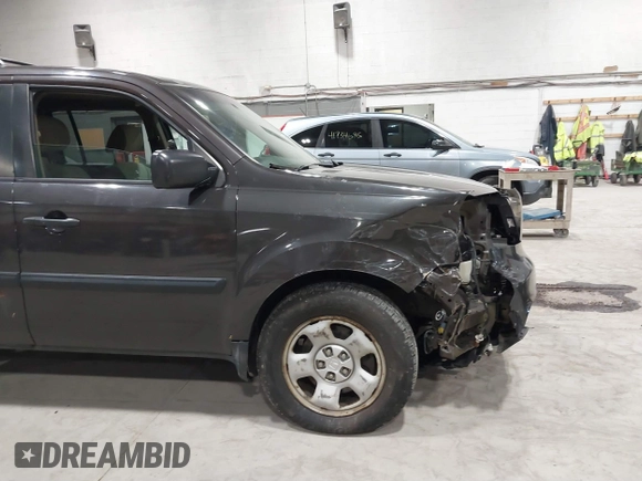 2012 Honda Pilot LX with VIN 5FNYF4H28CB005127, listed as a IAAI auction lot 41742168 with 133,225 mi miles and . Bid and sale history available at carsss.com. Image 6.