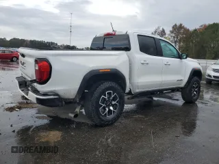 2024 GMC Canyon 4WD AT4X with VIN 1GTP6EEKXR1134879, listed as a Copart auction lot 80822964 with 12,567 mi miles and Salvage Title. Bid and sale history available at carsss.com. Image 3.