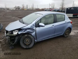 2012 Toyota Yaris L with VIN JTDKTUD33CD517298, listed as a Copart auction lot 52099335 with Not Provided miles and Salvage Title. Bid and sale history available at DreamBid. Image 1.