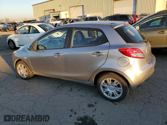 2014 Mazda 2 Sport with VIN JM1DE1KZ6E0184808, listed as a Copart auction lot 83399384 with 96,866 mi miles and Salvage Title. Bid and sale history available at carsss.com. Image 2.