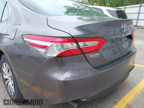 2019 Toyota Camry Hybrid LE z VIN 4T1B31HK4KU511360, wystawiony jako IAAI lot #42298260 z przebiegiem 133 019 mil mil oraz . Historia ofert i sprzedaży dostępna na DreamBid. Obrazek 18.