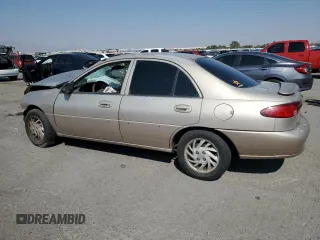 1999 Ford Escort SE with VIN 1FAFP13P7XW177713, listed as a Copart auction lot 70439304 with 125,781 mi miles and Salvage Title. Bid and sale history available at carsss.com. Image 2.