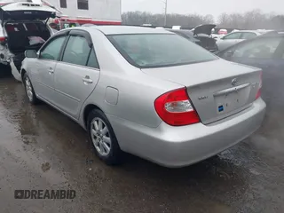 2004 Toyota Camry LE with VIN 4T1BF30K14U578385, listed as a IAAI auction lot 41547709 with 217,434 mi miles. Bid and sale history available at carsss.com. Image 3.