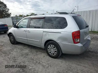 2012 Kia Sedona LX with VIN KNDMG4C79C6496785, listed as a Copart auction lot 73310344 with 130,243 mi miles and Salvage Title. Bid and sale history available at carsss.com. Image 2.