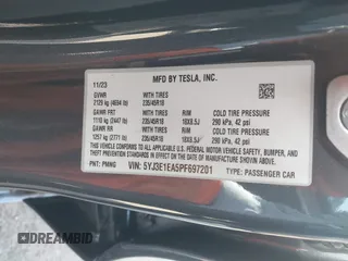 2023 Tesla Model 3 with VIN 5YJ3E1EA5PF697201, listed as a IAAI auction lot 41589422 with 16,862 mi miles and . Bid and sale history available at carsss.com. Image 9.
