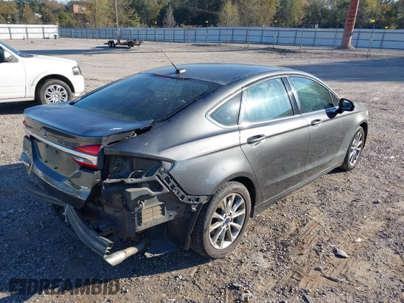 2017 Ford Fusion SE with VIN 3FA6P0H71HR369779, listed as a IAAI auction lot 40942962 with 123,956 mi miles and . Bid and sale history available at DreamBid. Image 4.